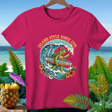 Pink t-shirt with cartoon turtle surfing a wave, 