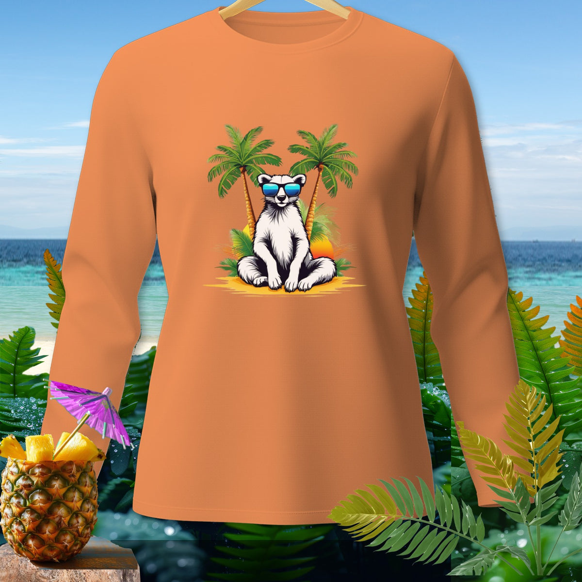 Orange long-sleeve shirt with a polar bear in sunglasses on a beach.