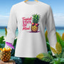 White long-sleeve shirt with "Tropical STATE OF Mind" text and sunglasses-wearing pineapple graphic.