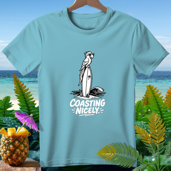 Light blue t-shirt with a parrot on a surfboard graphic and "Coasting Nicely" text.