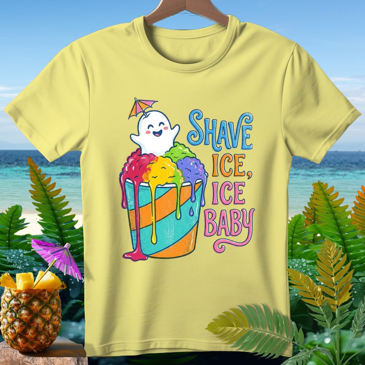 Yellow t-shirt with a cute ghost and a cup of rainbow shave ice, text "SHAVE ICE, ICE BABY".