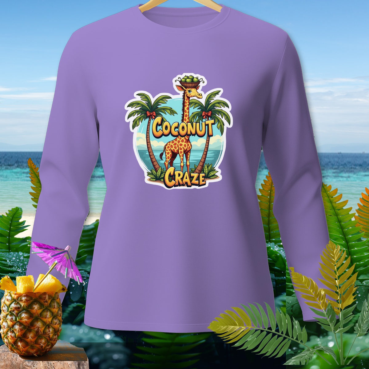 Lavender long-sleeve shirt with "Coconut Craze" graphic featuring a giraffe and palm trees.