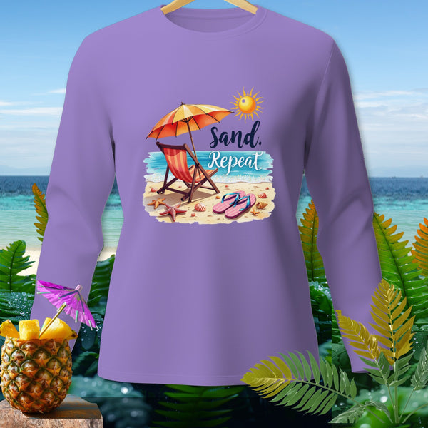 Purple long sleeve shirt with beach graphic and "Sand. Repeat." text.