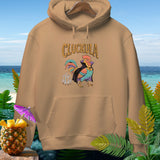 Beige hooded sweatshirt featuring a graphic of a colorful rooster vampire and ghost figures under the text CLUCKULA.