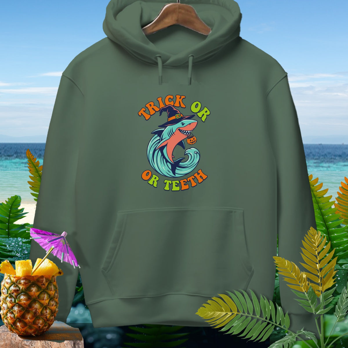 Green hoodie with a Halloween shark graphic reading "Trick Or Or Teeth".