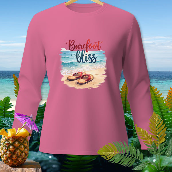 Pink long sleeve shirt with "Barefoot bliss" graphic on a beach scene.