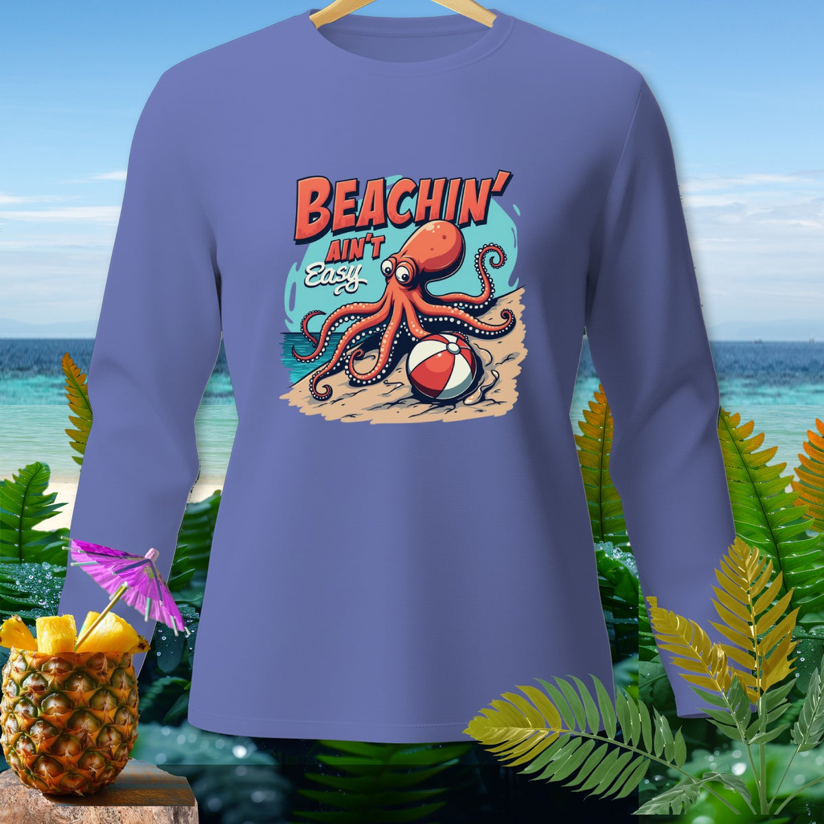 Long sleeve shirt with cartoon octopus and beach scene graphic and text "BEACHIN' AIN'T Easy".