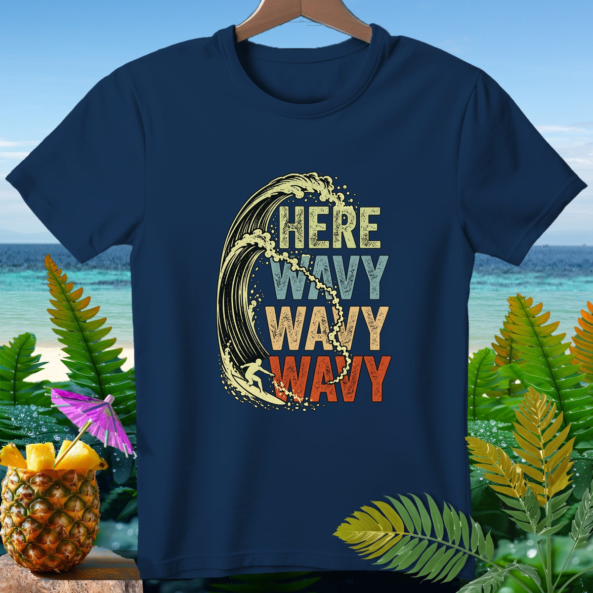 Navy t-shirt with "HERE WAVY WAVY WAVY" text and a surfer riding a wave.