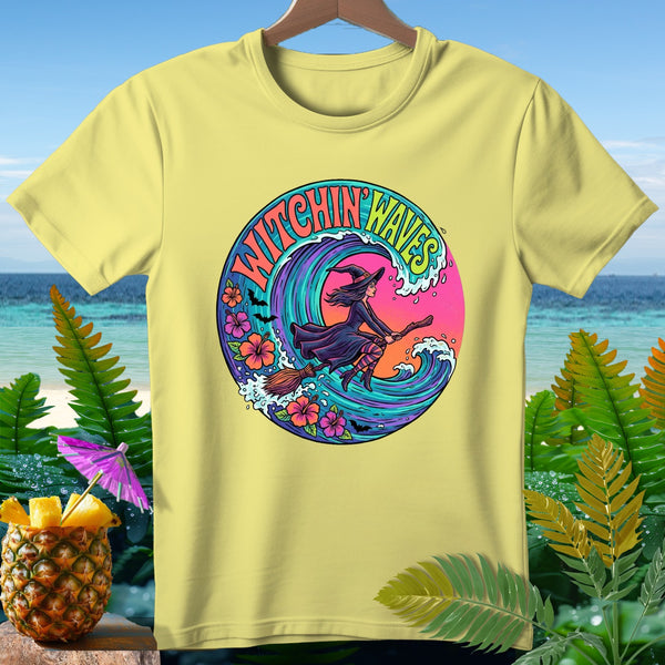 Light yellow t-shirt with "Witchin' Waves" text and a witch on a broom.