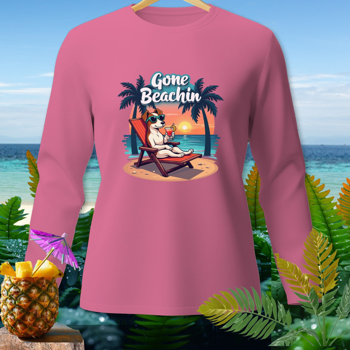 Pink long-sleeved shirt with "Gone Beachin'" graphic of a dog on a beach.