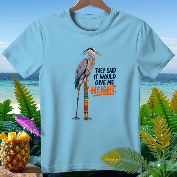 Light blue t-shirt with heron on tiki pole and text "They said it would give me HEIGHT."