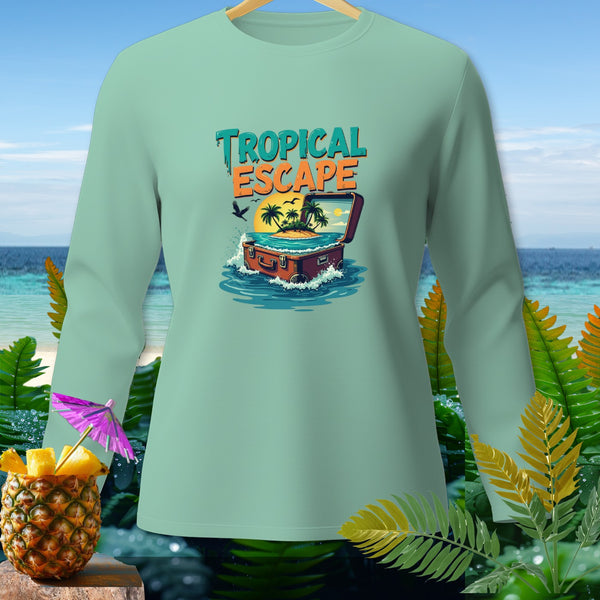 Mint green long-sleeve shirt with "Tropical Escape" graphic and open suitcase spilling into water.