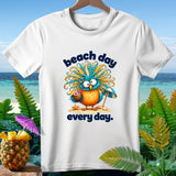 White t-shirt with a cartoon owl holding a coconut drink and 