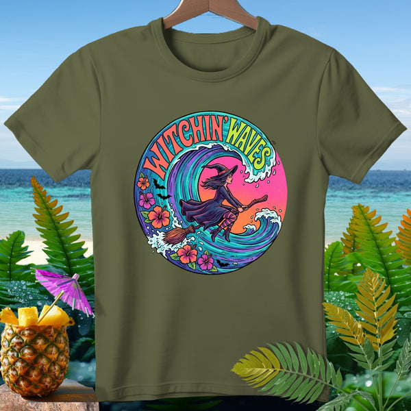 Green t-shirt with witch riding broom over wave, "Witchin' Waves" text.
