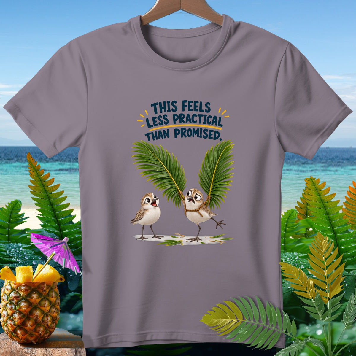 Grey t-shirt with two birds and text: "This feels less practical than promised."