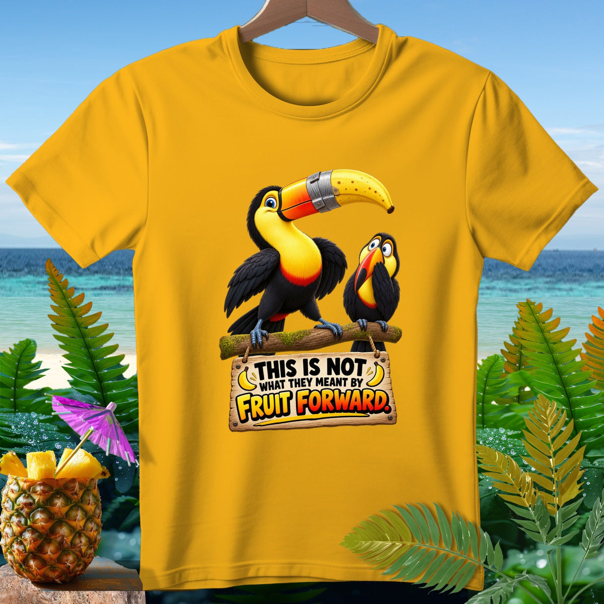 Yellow t-shirt with toucans and text "THIS IS NOT WHAT THEY MEANT BY FRUIT FORWARD."