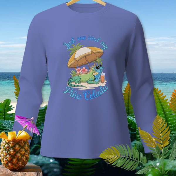 Iguana relaxing with a drink under an umbrella, "Just me and my Piña Colada" text.