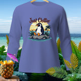 Purple long-sleeve shirt with a cartoon penguin saying 