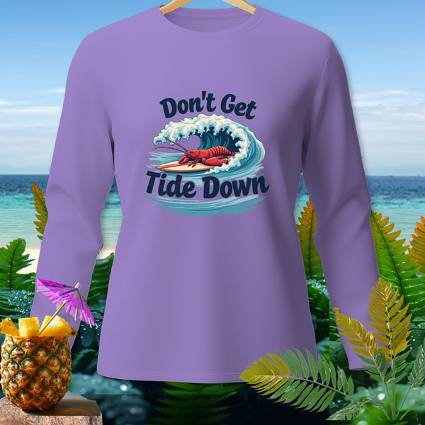 Lavender long-sleeve shirt with a lobster surfing a wave and text "Don't Get Tide Down."