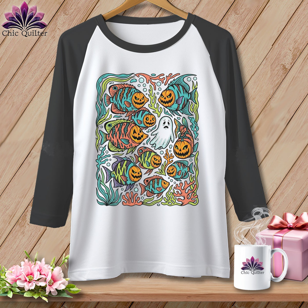 Halloween fish with jack-o'-lantern faces and a ghost in coral on a white baseball tee.