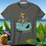 Skeleton with a straw in a pineapple drink in the ocean, shark fin nearby, text 