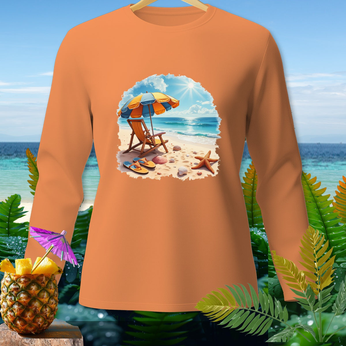 Orange long-sleeve shirt with a beach scene graphic featuring a chair and umbrella.