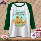 Raglan t-shirt with skeleton, pumpkin, and ghost graphic that reads 