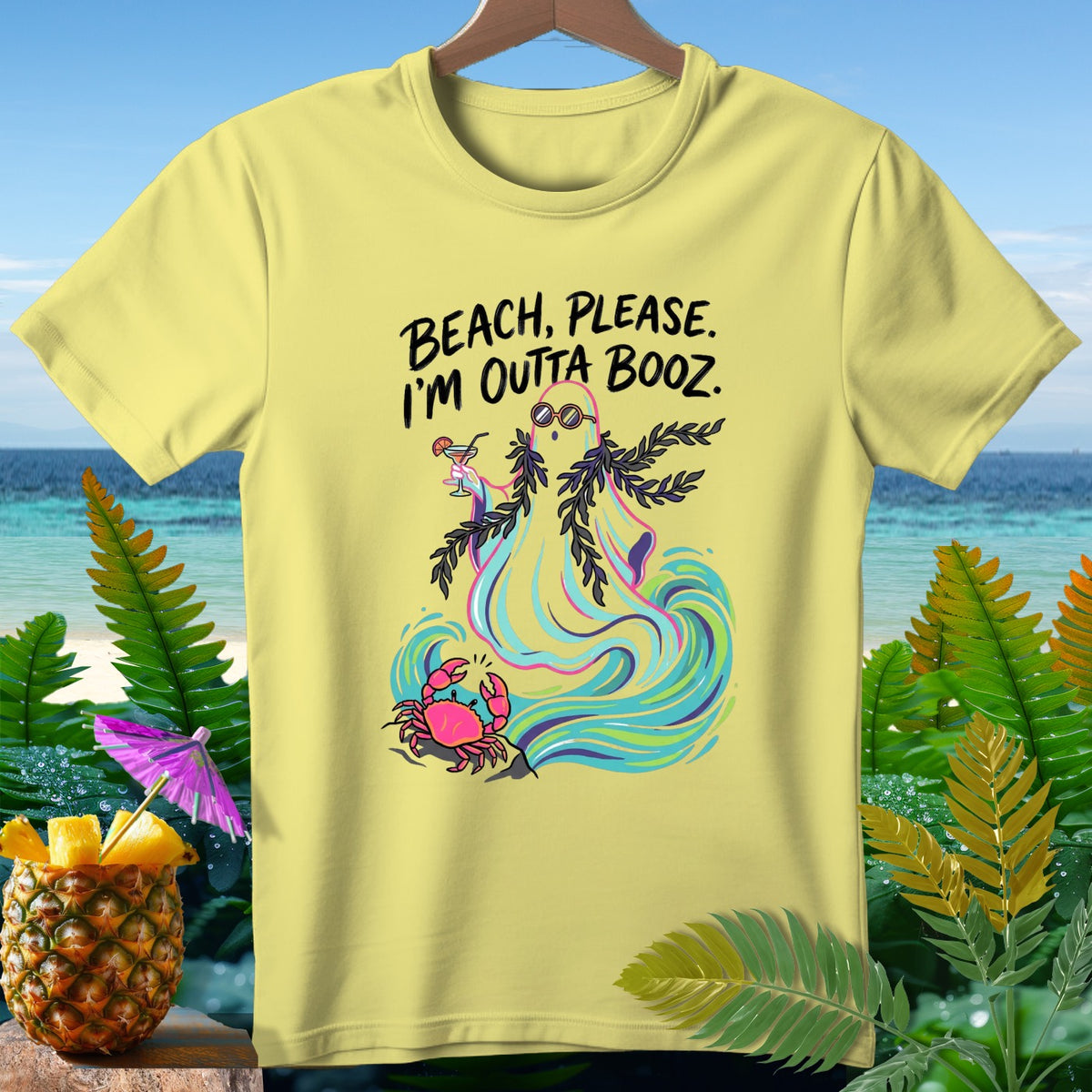 Yellow t-shirt with "Beach, please. I'm outta booz." text and ghost, crab, and palm tree design.