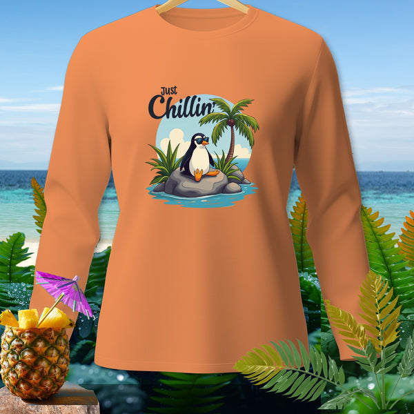 Orange long-sleeve shirt with a penguin wearing sunglasses and text "Just Chillin".