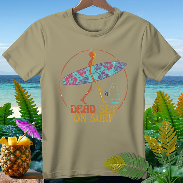 T-shirt with skeleton carrying surfboard and text "DEAD SET ON SURF".