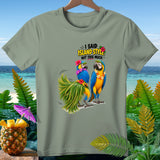 Two macaws wearing leis and flowers, with text 