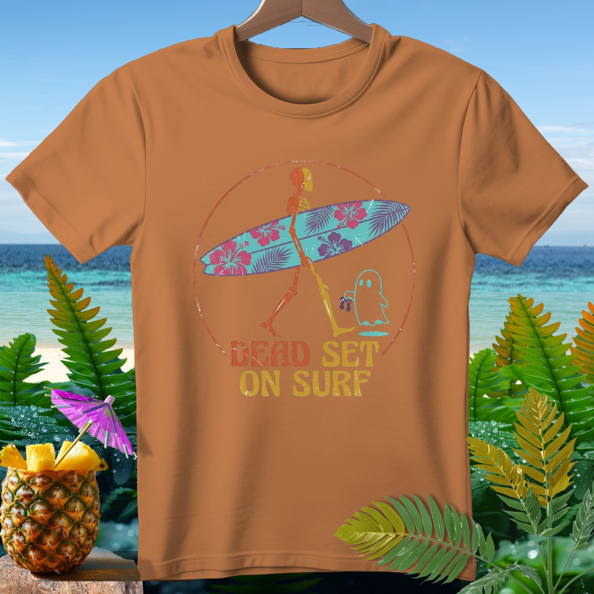 Skeleton carrying surfboard with ghost, text reads "DEAD SET ON SURF".