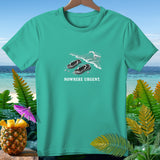 Turquoise t-shirt with flip-flops on a beach and the text NOWHERE URGENT.