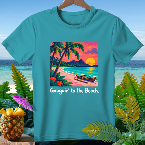 Teal t-shirt with tropical beach sunset design and text "Gauguin' to the Beach."