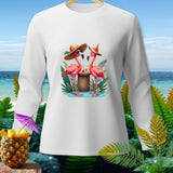 White long-sleeve shirt with two flamingos in hats and sunglasses on a tropical beach.