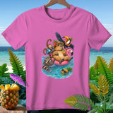 Pink t-shirt with capybara, raccoon, monkey, and toucan on a flamingo float.