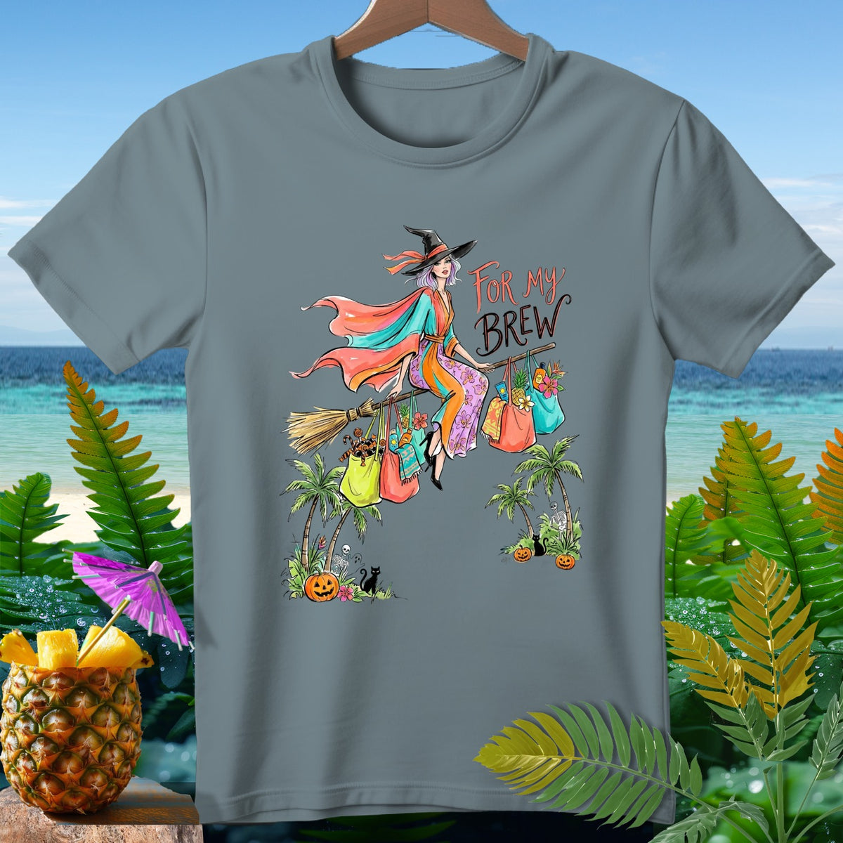 Graphic on gray t-shirt shows witch flying with shopping bags, text "FOR MY BREW".