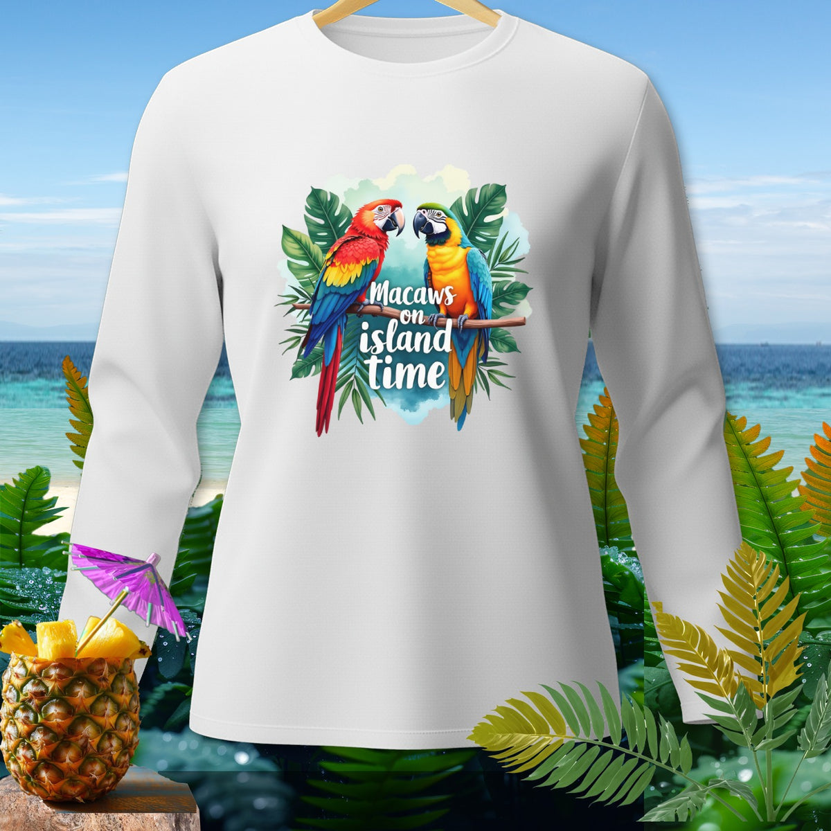 White long sleeve shirt with "Macaws on island time" text and two macaws.