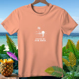 Peach t-shirt with white graphic of a palm tree island and text 