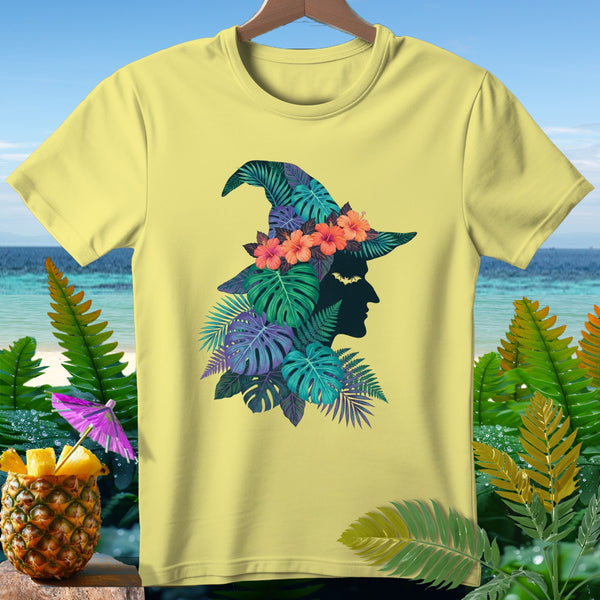 Yellow t-shirt with witch hat and tropical leaves design.