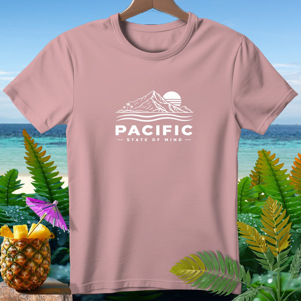 Pink t-shirt with white graphic of mountains, sun, and ocean waves with text "PACIFIC STATE OF MIND".