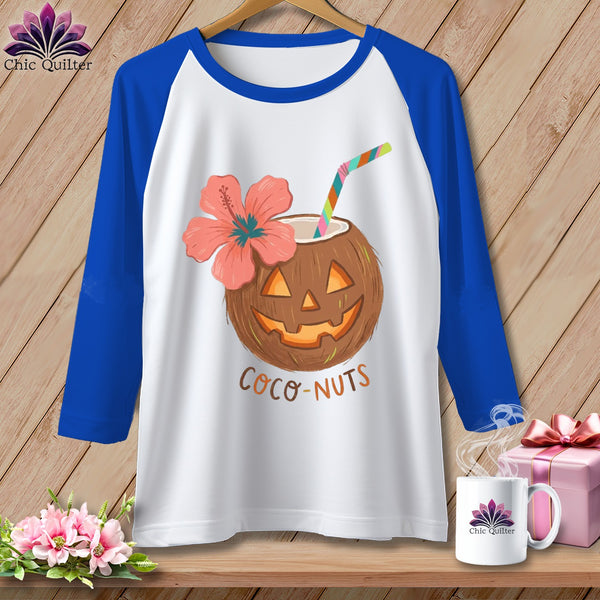 White baseball tee with a grinning coconut drink and the text "COCO-NUTS".