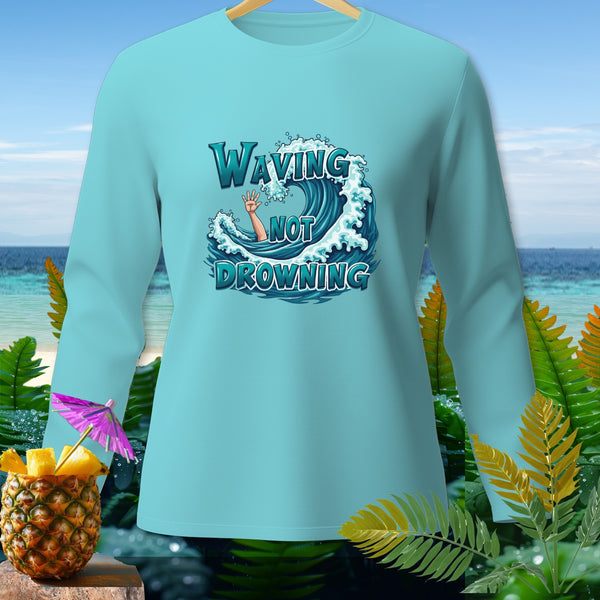 Aqua long sleeve shirt with "Waving Not Drowning" text over a wave graphic.