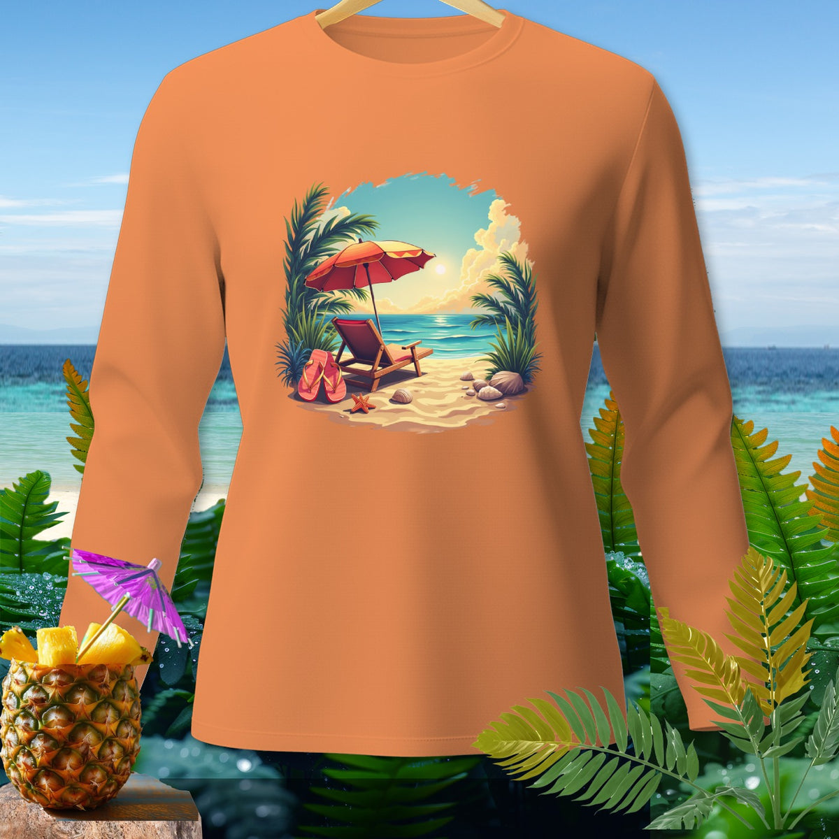 Orange long-sleeve shirt featuring a beach scene with umbrella and lounge chair graphic.
