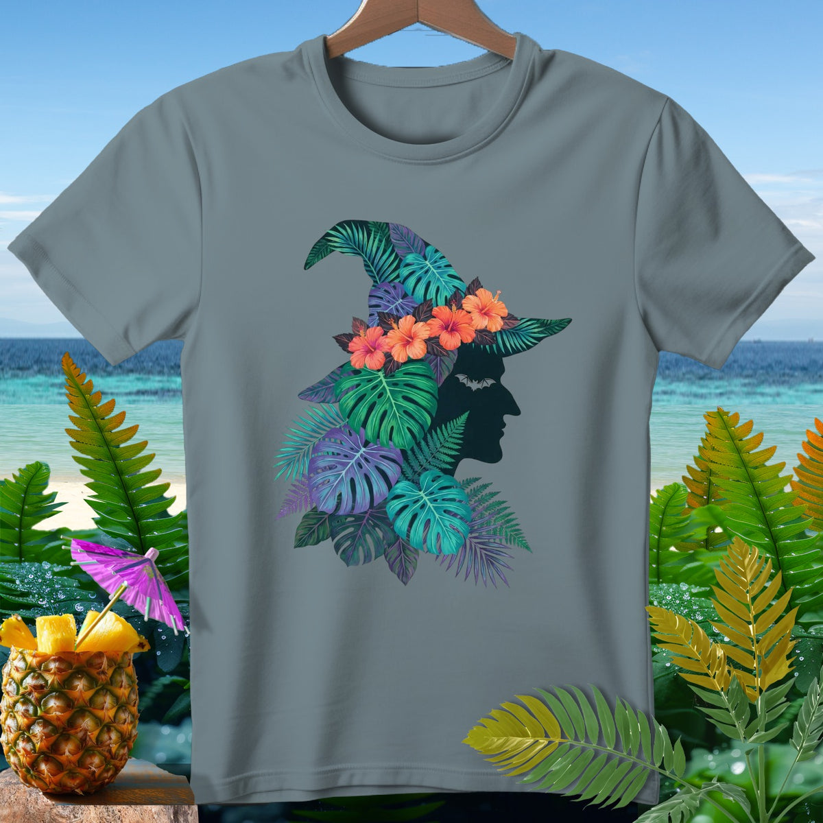 Gray t-shirt with a tropical witch hat design featuring flowers and leaves.