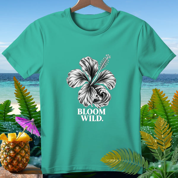 Teal t-shirt with black and white hibiscus flower graphic and "BLOOM WILD." text.