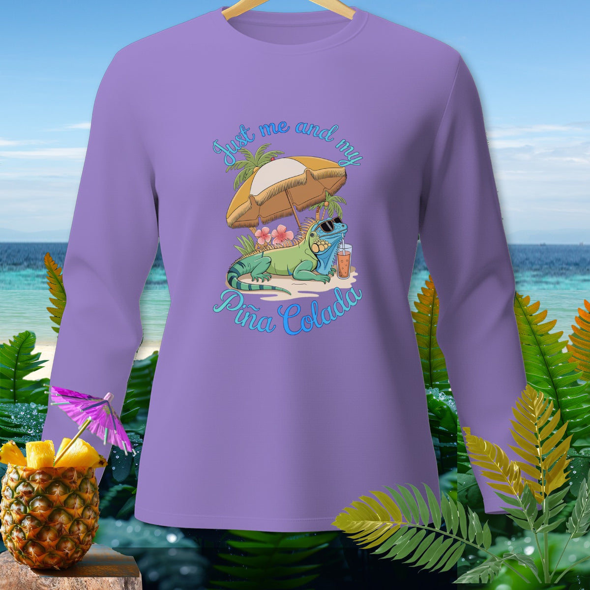 Purple long sleeve shirt with iguana, umbrella, and "Just me and my Piña Colada" text.