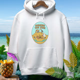 White hoodie with a graphic of skeletons and ghosts digging on a beach, text reads 