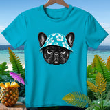 Turquoise t-shirt with black French bulldog wearing a floral hat and tropical background.