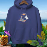 Skeleton and ghost enjoy drinks on beach blanket with text 